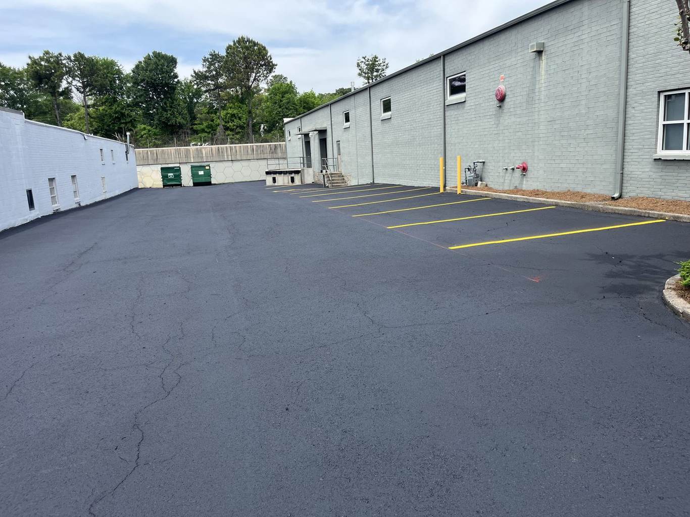 Freshly resurfaced asphalt lot with new striping, Metro Atlanta